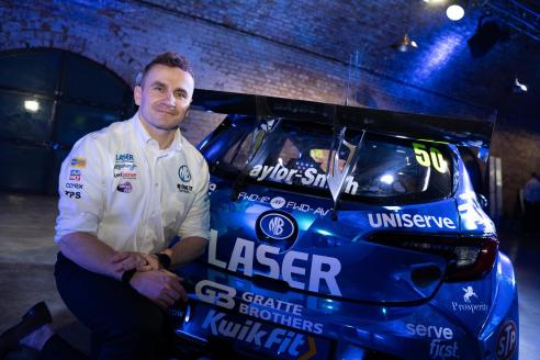 Aron Taylor Smith with the distinct blue Laser Tools Racing car